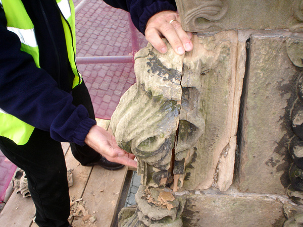 Before works: degree of deterioration to carved sandstone detail.