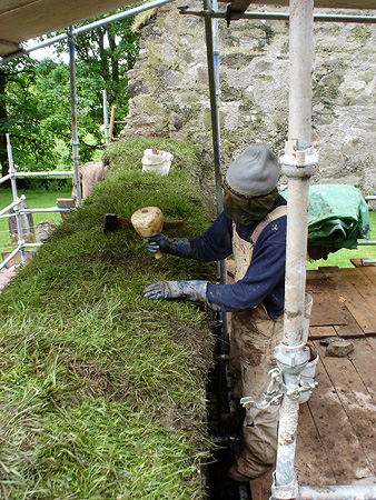 During works: soft topping to wallhead.