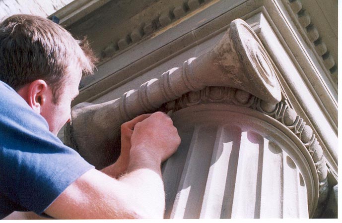 During works: carving of volute moulding.