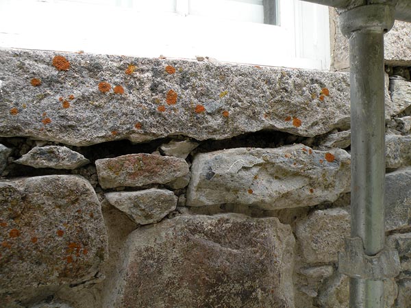 Masonry: window cill pointing.