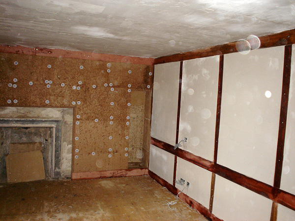 Internal lime plastering works: works included consolidation and repair of original masonry fireplace.