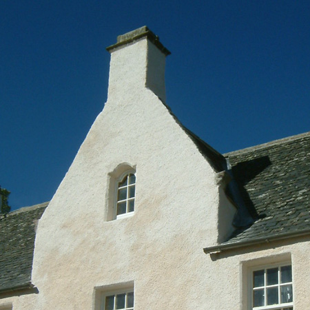 Front elevation: lime harling close up.