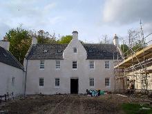 Front elevation: reinstated lime harling.