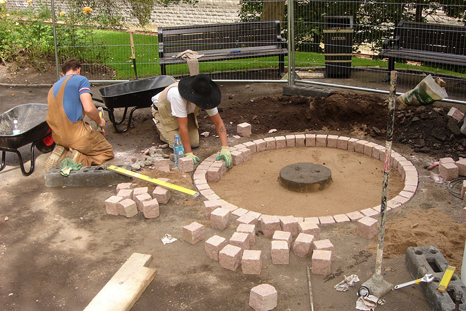 Mary Slessor Memorial: setting out concrete foundation and granite set.