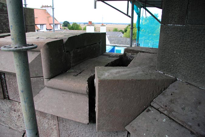 Crenellated parapet: movement to stonework.