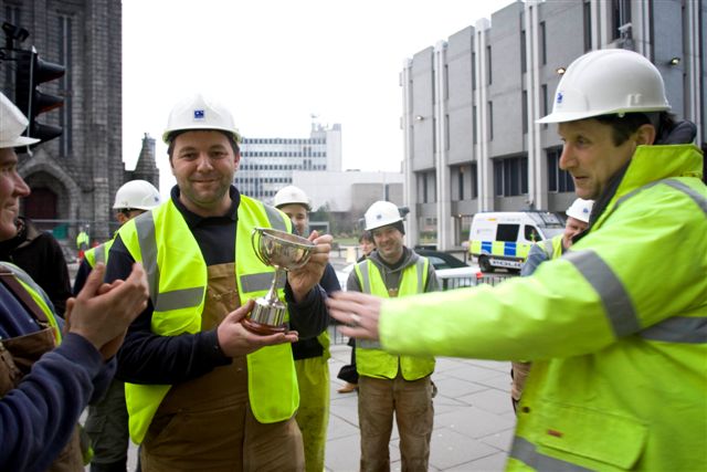 Steven Harper receives his Employee of the Year trophy at the Marischal topping out ceremony