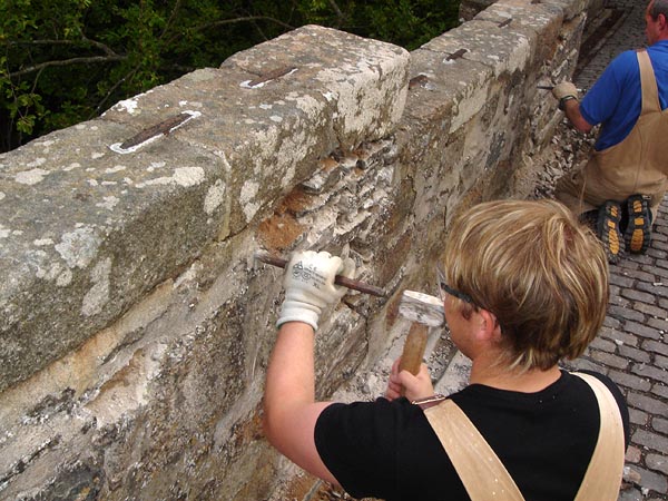 Repair works: extent of mortar and masonry removal.