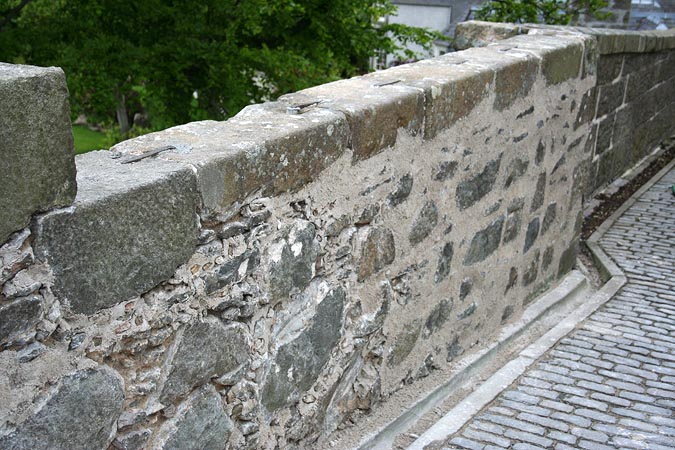 Pinning work up to granite ashlar.