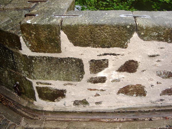 Flush pointing up to granite ashlar.