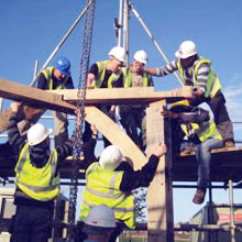 Photograph showing erection of the Timber Frame for the Pavillion.